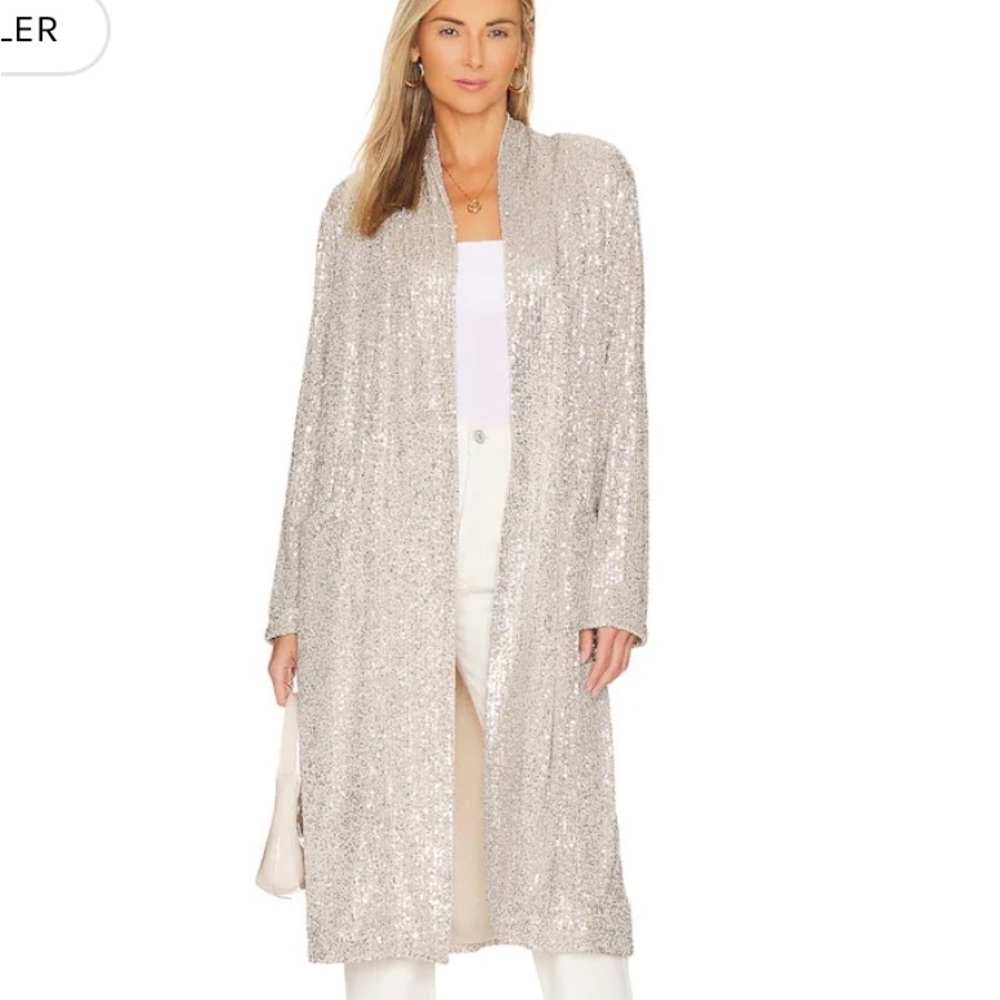 Beautiful silver sequin cardigan!  Great for the holidays! Size small